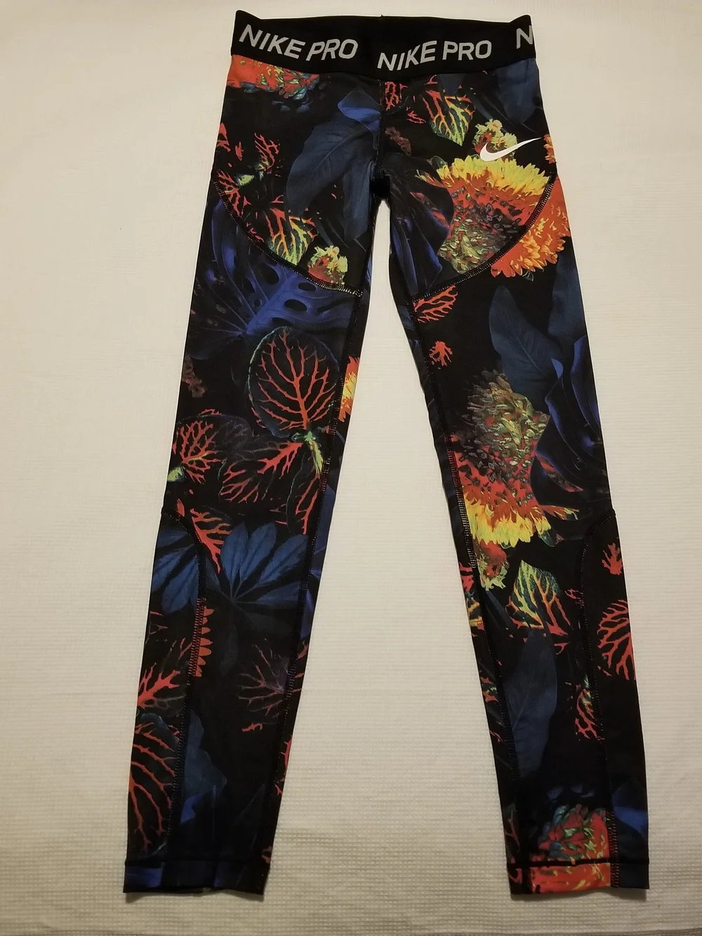 Nike Pro Girl's Small Black With Blue, Orange, & Yellow Floral Print Leggings